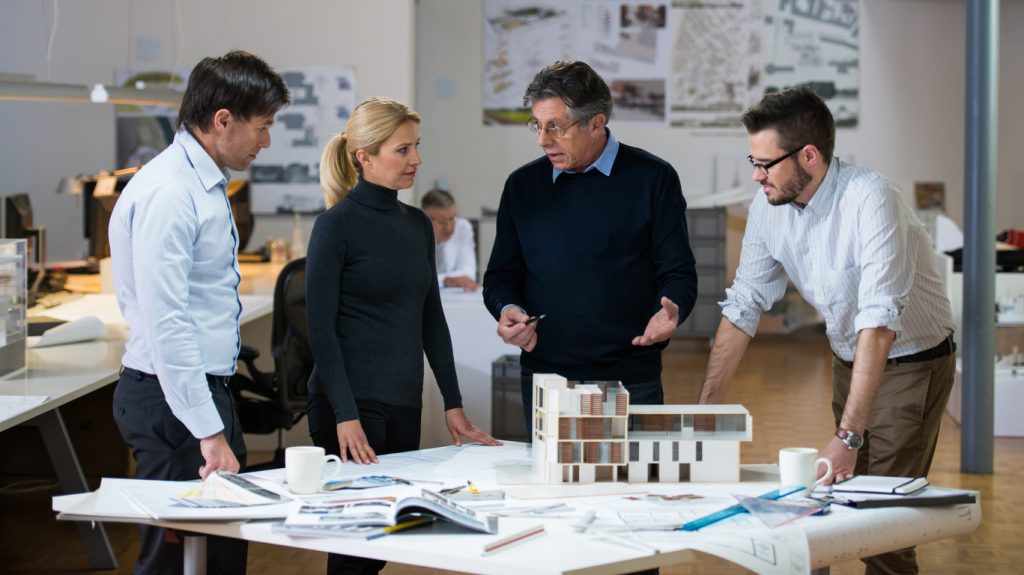 business people discussing construction budget