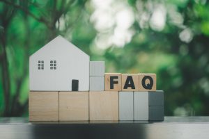 commercial construction frequently asked questions - wooden blocks spelling out "FAQ"