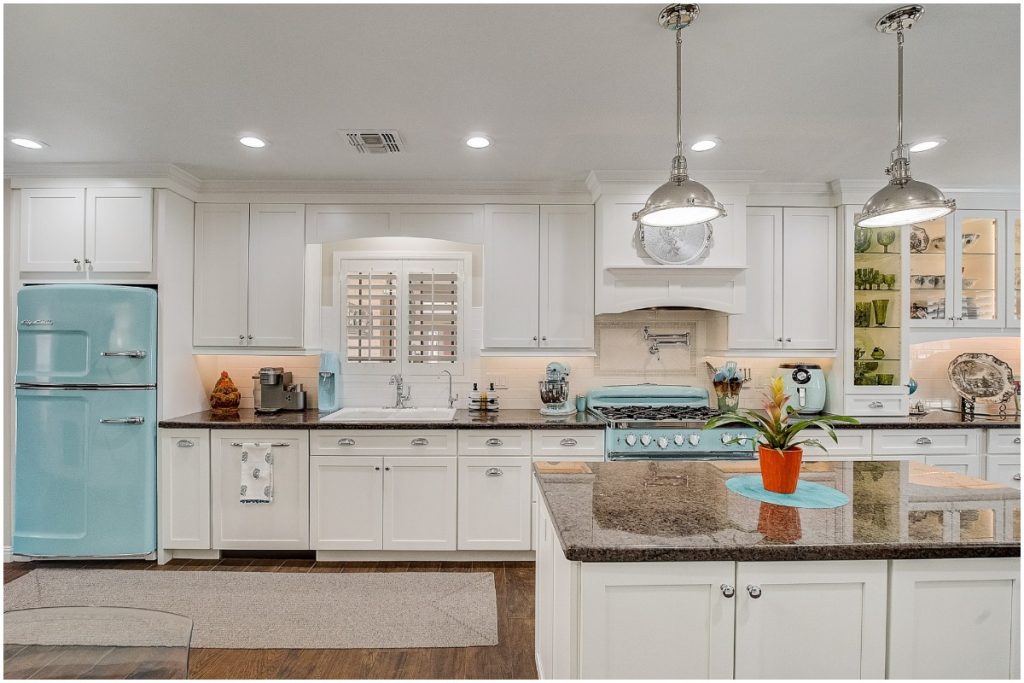 Pops of color, like these blue appliances, are one of many design options for your kitchen renovation