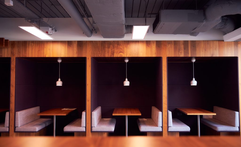 Restaurant booths with dividing walls