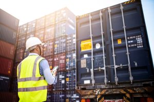 Construction Foreman controls unloading freight shipping containers and managing construction material inventory.