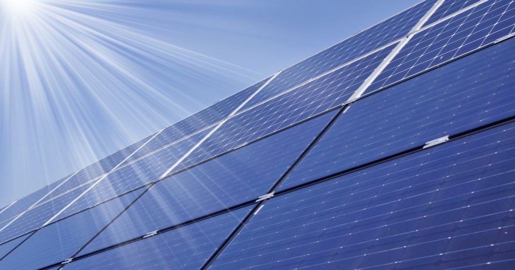 Solar panels installed in commercial building renovation to maximize energy efficiency